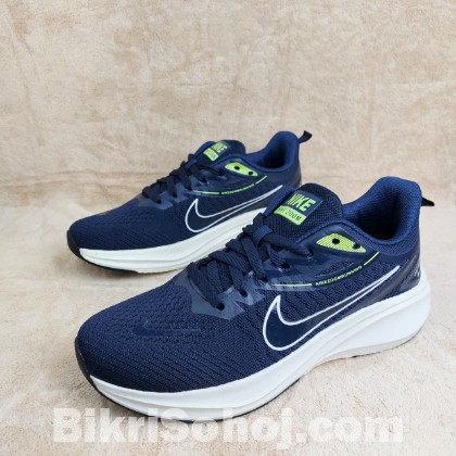 Nike Zoom Running shoes in navy blue with white midsoles